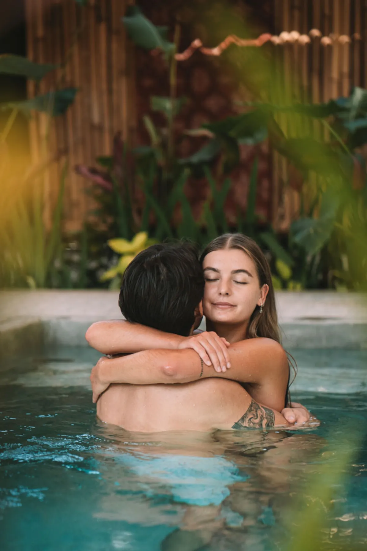 Couple at Hesa Wellness Spa Ubud pool romantic