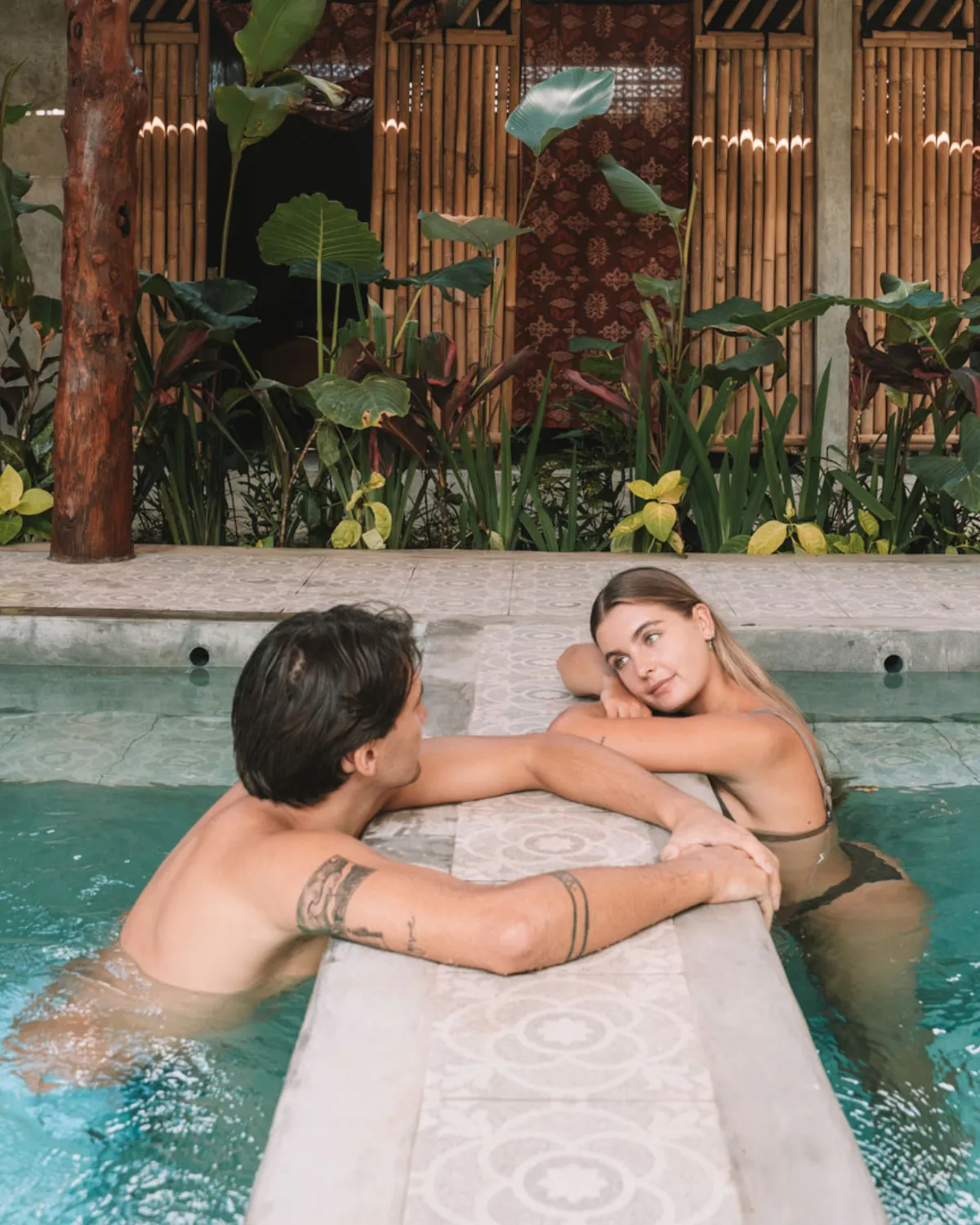Couple at Hesa Wellness Spa plunge pool Ubud Bali couples spa