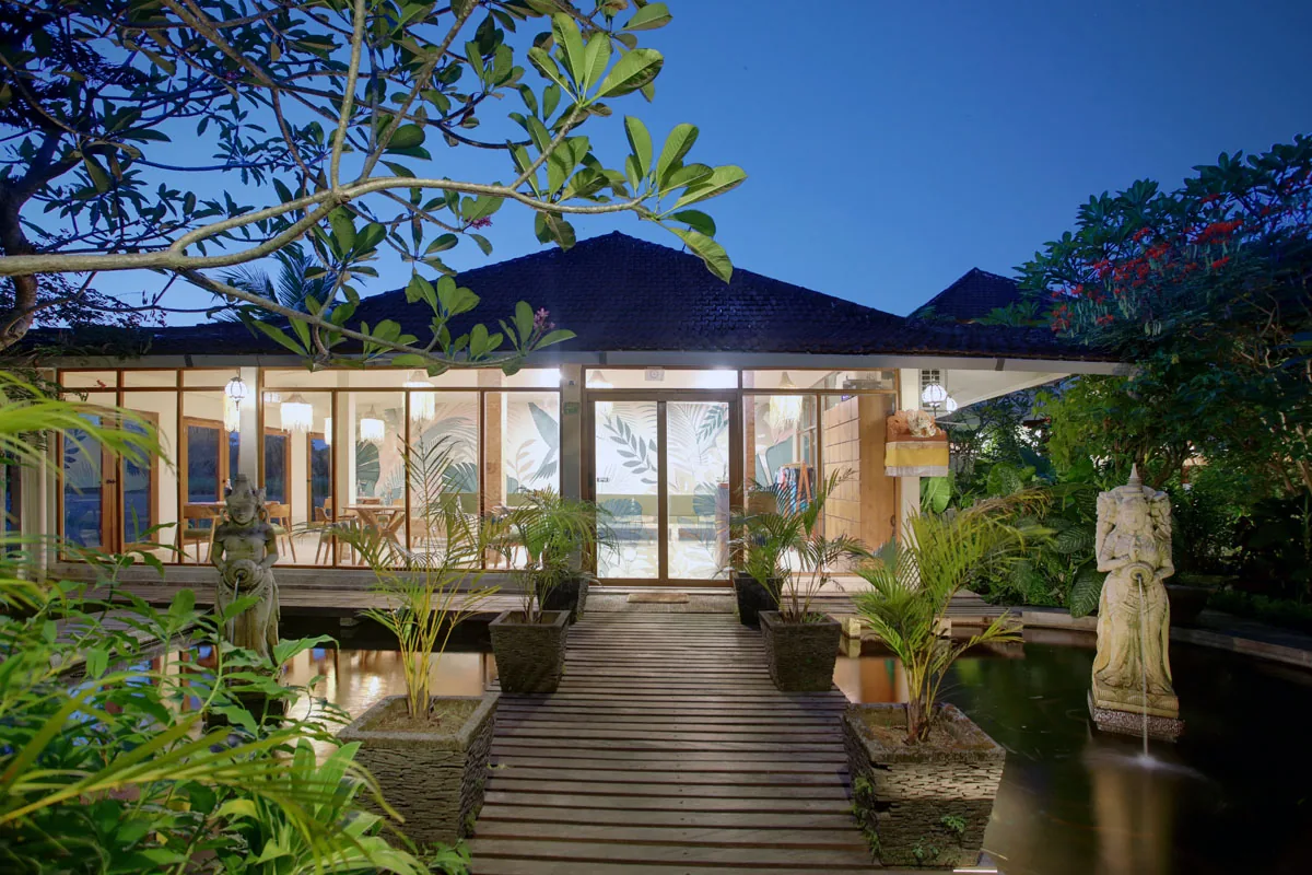 Hesa Downtown Monkey Forest Road Ubud entrance with koi pond at twilight
