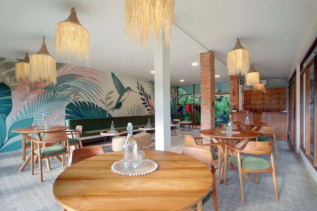 Hesa Downtown lobby with tropical hummingbird mural, Ubud Bali