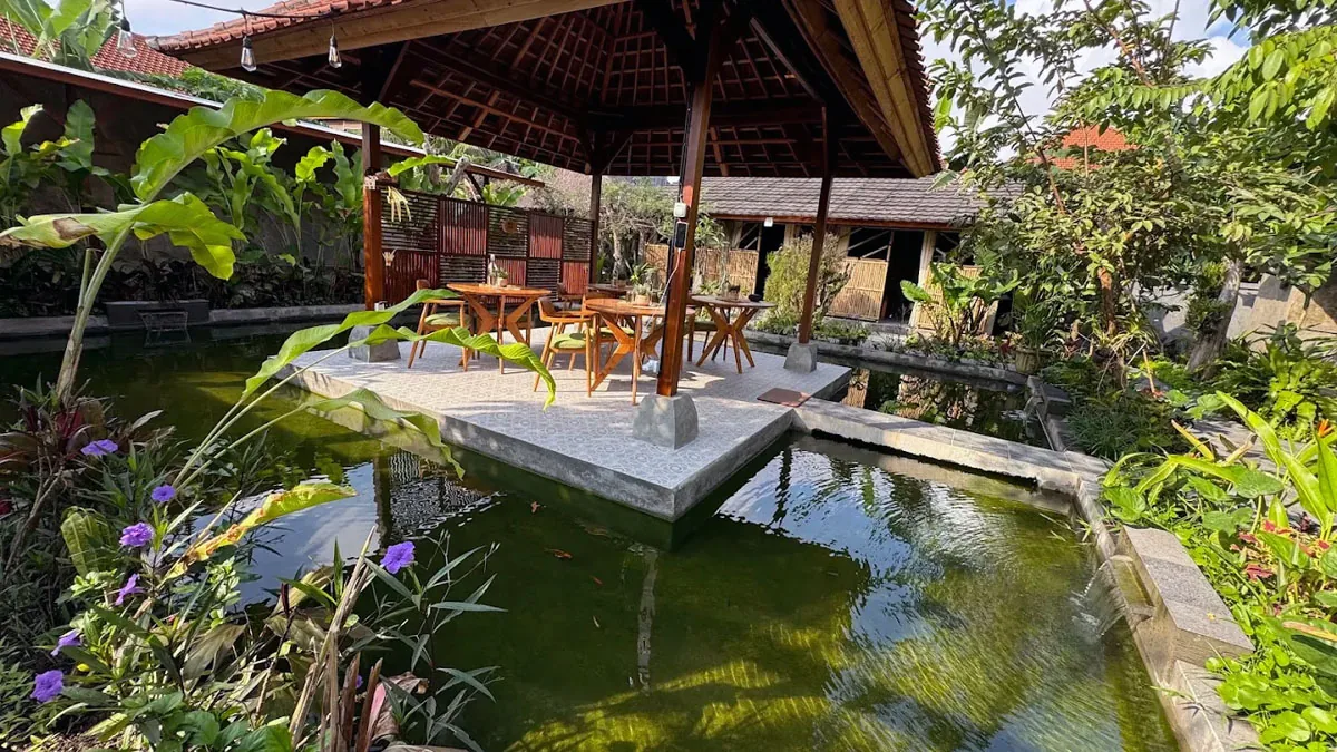 Hesa Spa Sandat koi pond and lily pads with garden seating, Ubud Bali